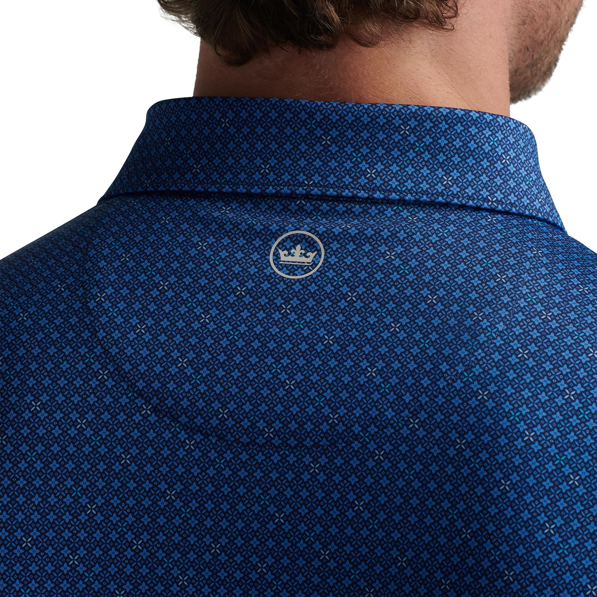Back view close-up of Peter Millar logo and collar on Castellina Polo – mens golf polo shirt UK